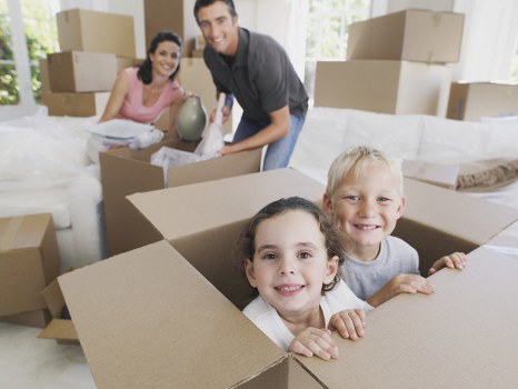 Loading furniture into a van for a London relocation