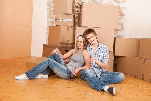 Man and van loading furniture for a London home move