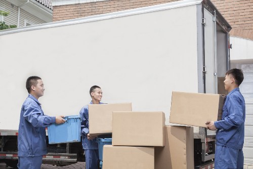Unpacking boxes into a new London property after a move
