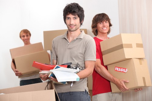 Local removals crew assisting with a house move in London