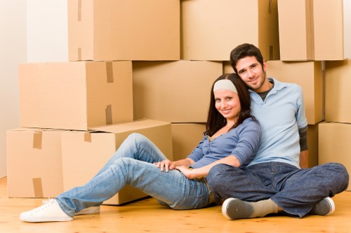 Moving van and removal team in a London residential street