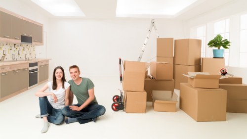 Boxes and household items organized inside a moving truck
