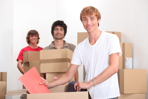 Removal crew loading items for a city office move