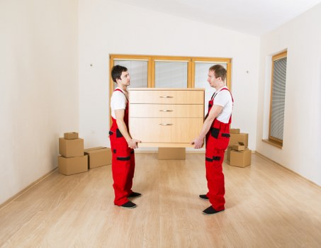 London office move logistics with desks and furniture in transit